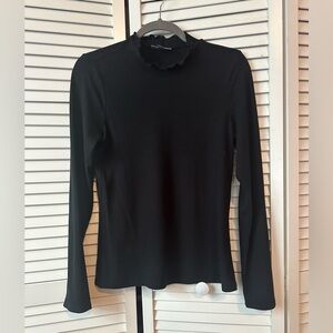 Black ribbed ruffle collar mock turtleneck from ModCloth. Medium. EUC.